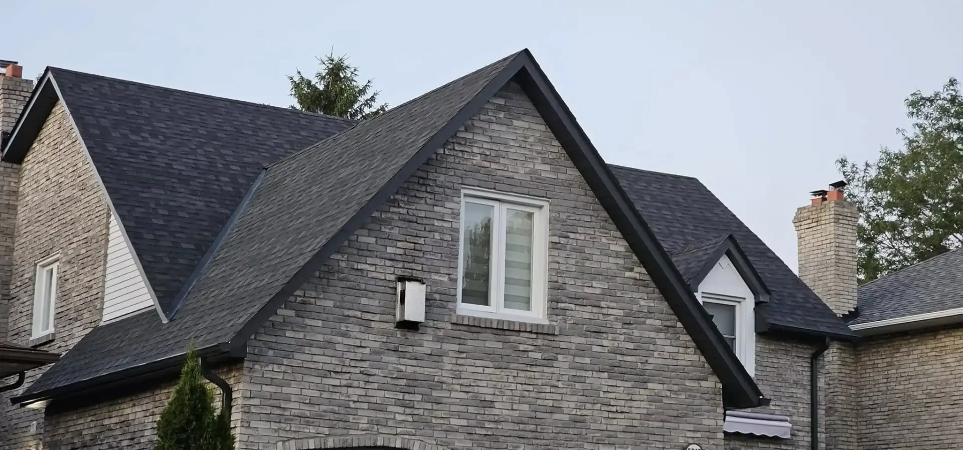 Aerial view of premium roofing work by AI Pro Roofing